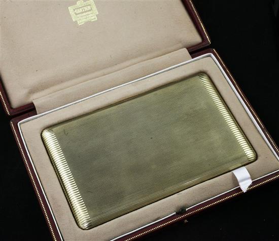 An early 1950s Cartier 9ct rectangular cigarette case with receipt and original boxes,